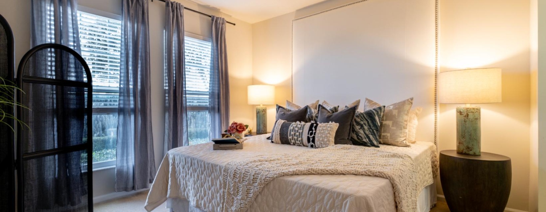 a bedroom with a large bed
