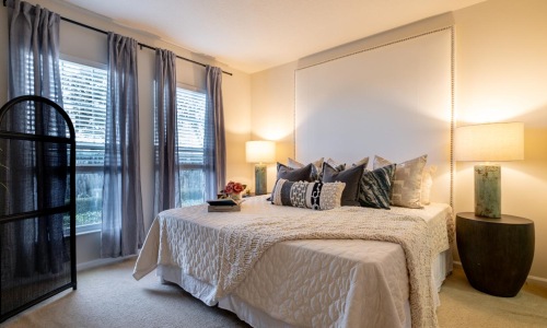 a bedroom with a large bed