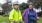 two people holding bicycles