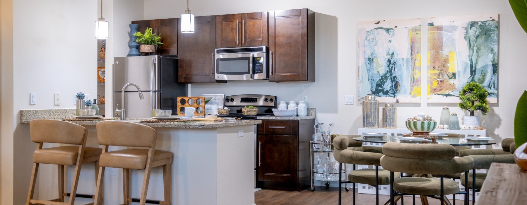 a kitchen with a table and chairs