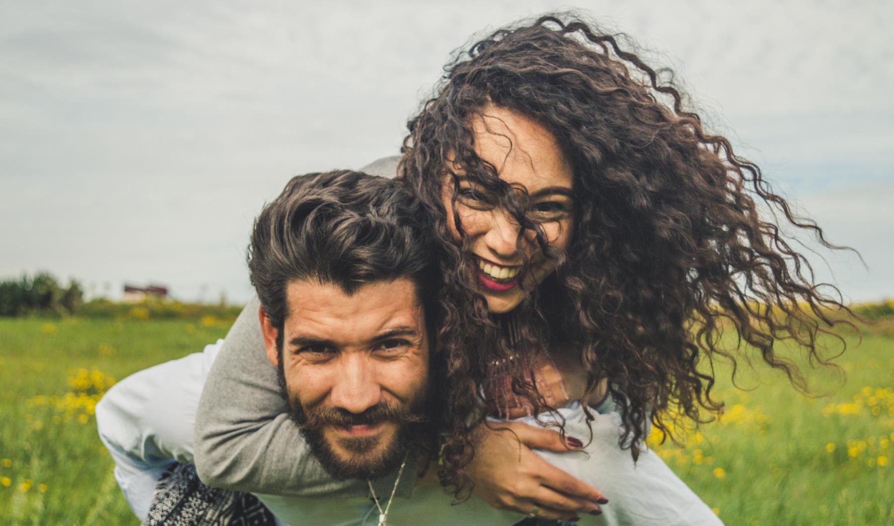 a man hugging a woman